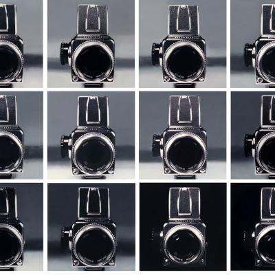 12 Hasselblads On Paper With Dark Background Copia 2